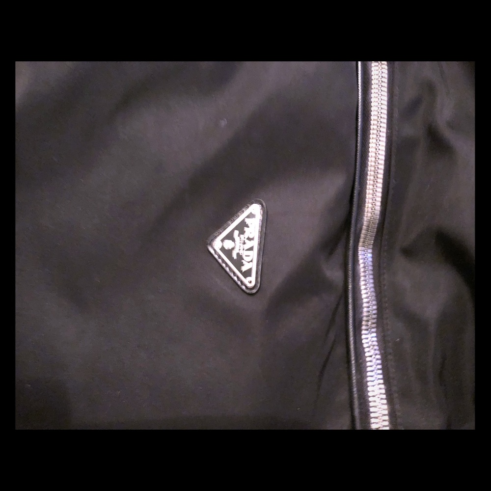Prada saffiano leather. Nylon travel bag